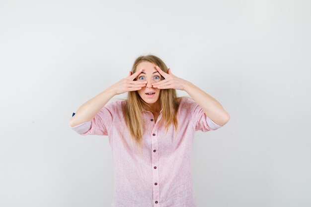 Expressive young woman posing in the studio