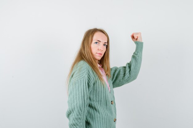 Expressive young woman posing in the studio