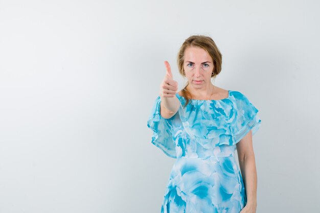 Expressive young woman posing in the studio