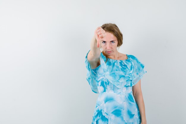 Expressive young woman posing in the studio