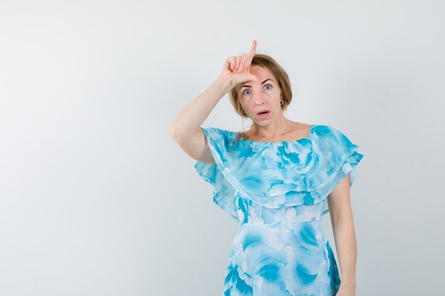 Expressive young woman posing in the studio