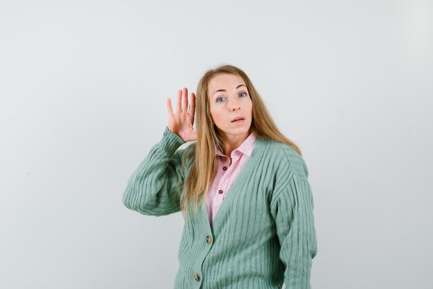 Expressive young woman posing in the studio