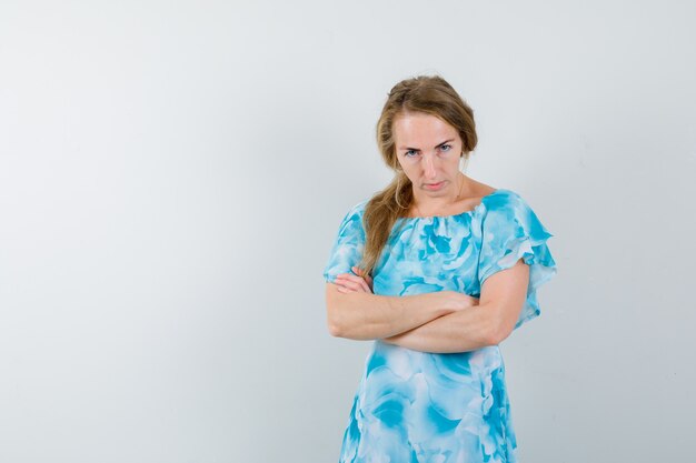 Expressive young woman posing in the studio