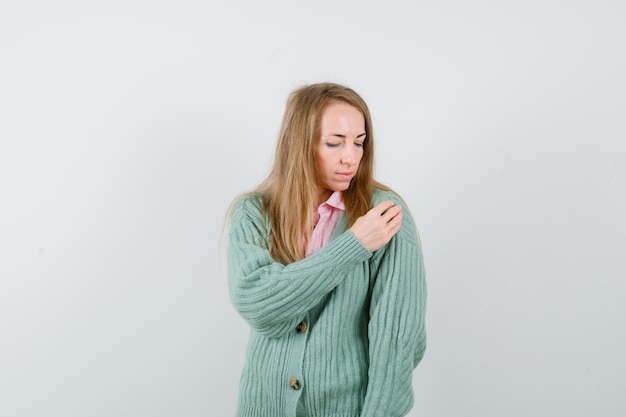 Expressive young woman posing in the studio