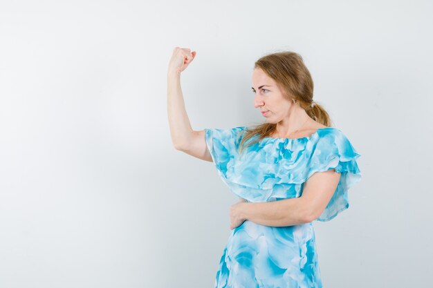 Expressive young woman posing in the studio