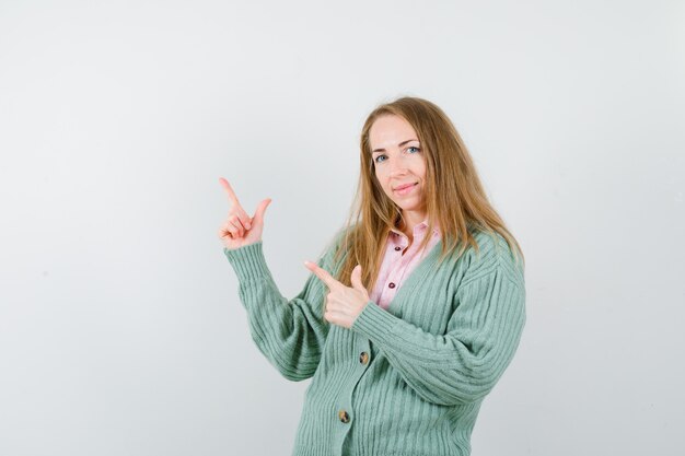 Expressive young woman posing in the studio