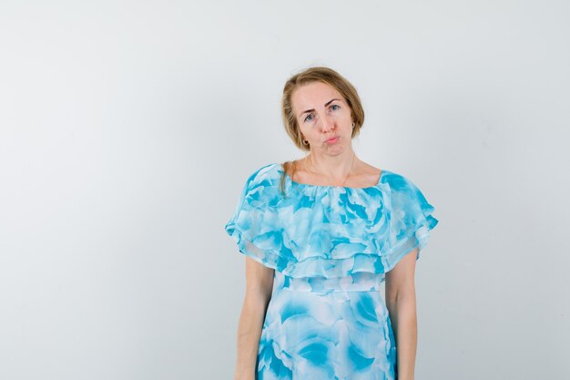 Expressive young woman posing in the studio