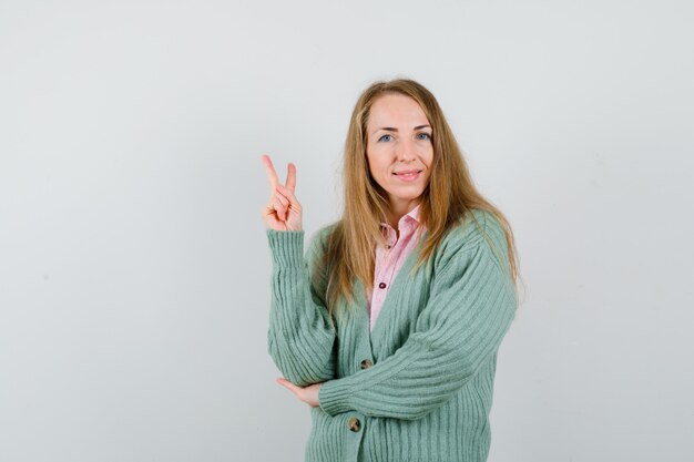 Expressive young woman posing in the studio