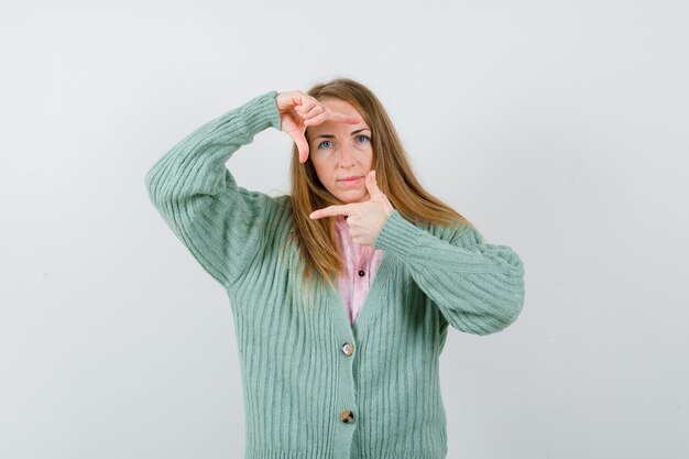 Expressive young woman posing in the studio