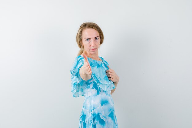 Expressive young woman posing in the studio