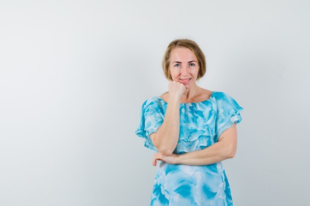 Expressive young woman posing in the studio