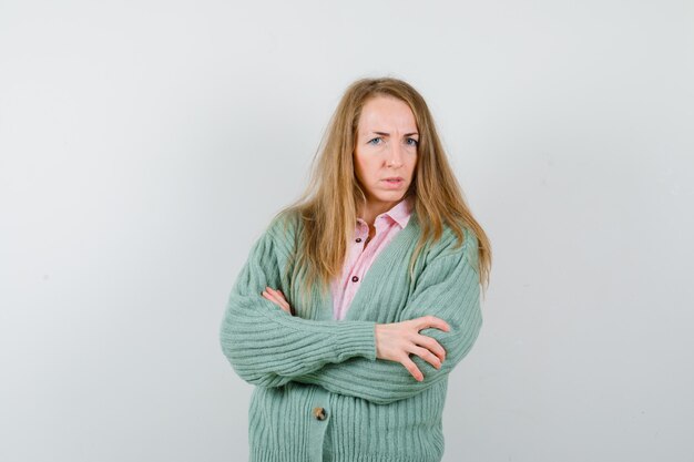 Expressive young woman posing in the studio