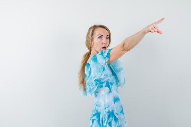 Expressive young woman posing in the studio