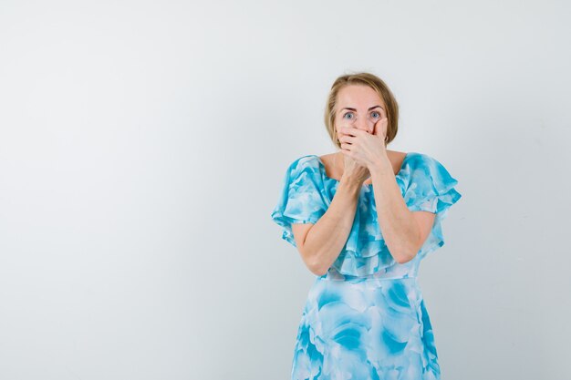 Expressive young woman posing in the studio