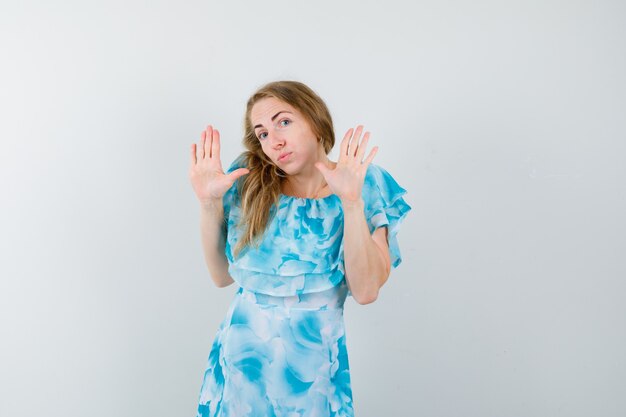 Expressive young woman posing in the studio