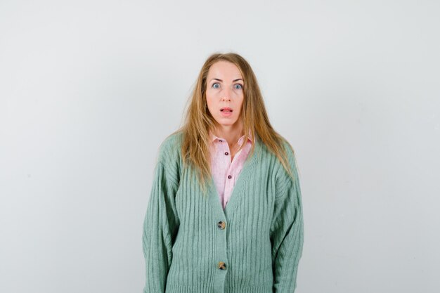 Expressive young woman posing in the studio