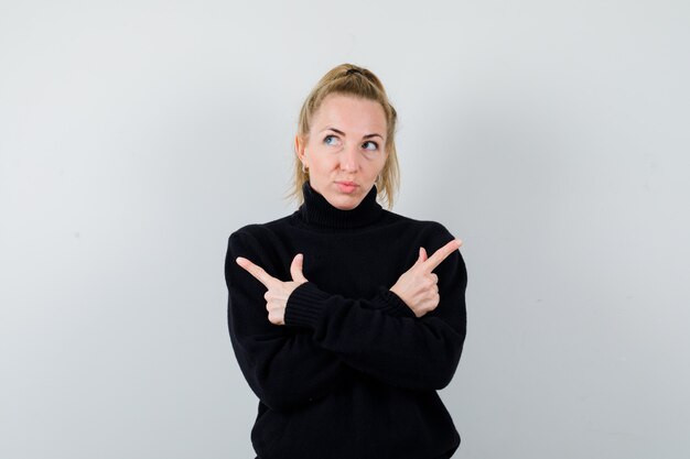 Expressive young woman posing in the studio