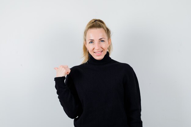 Expressive young woman posing in the studio