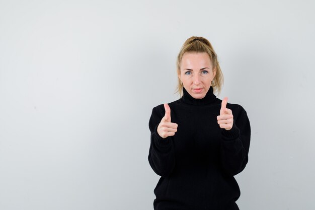 Expressive young woman posing in the studio