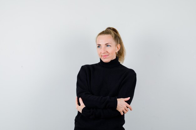 Expressive young woman posing in the studio