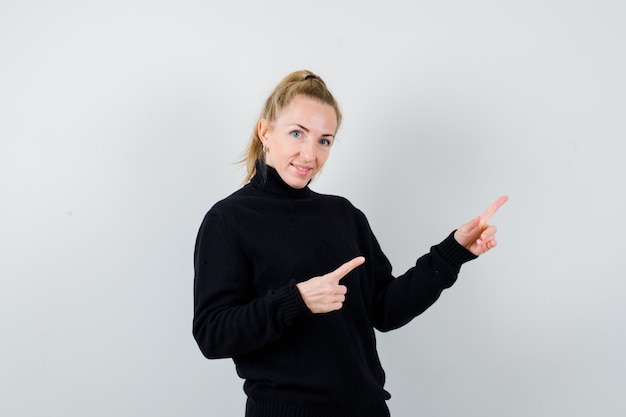 Expressive young woman posing in the studio