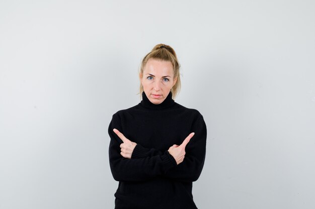 Expressive young woman posing in the studio