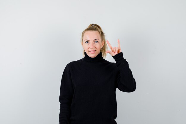 Expressive young woman posing in the studio