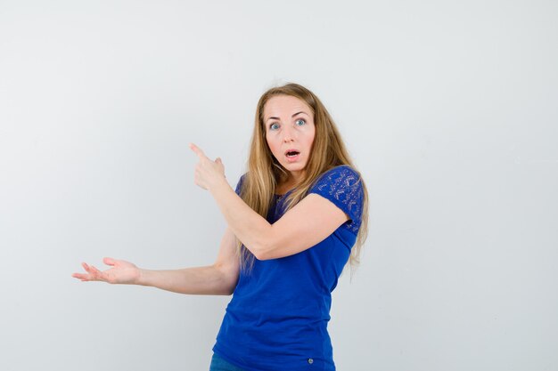 Expressive young woman posing in the studio