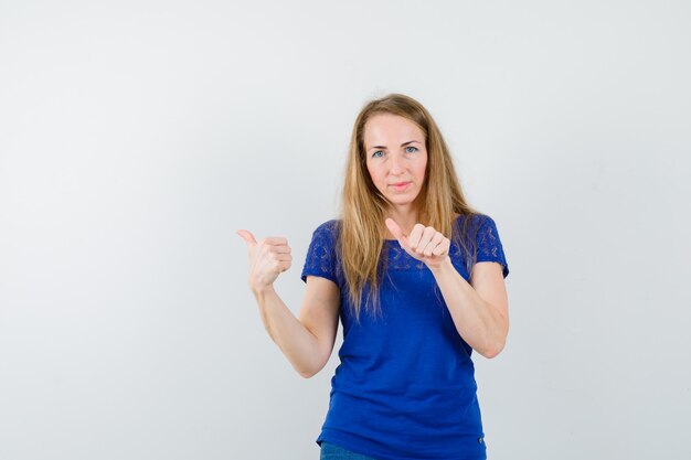 Expressive young woman posing in the studio