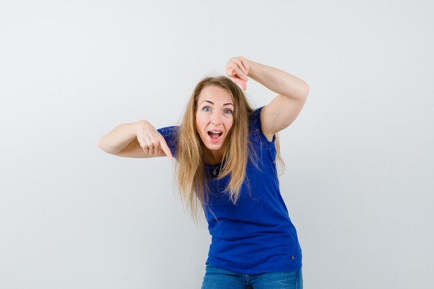 Expressive young woman posing in the studio