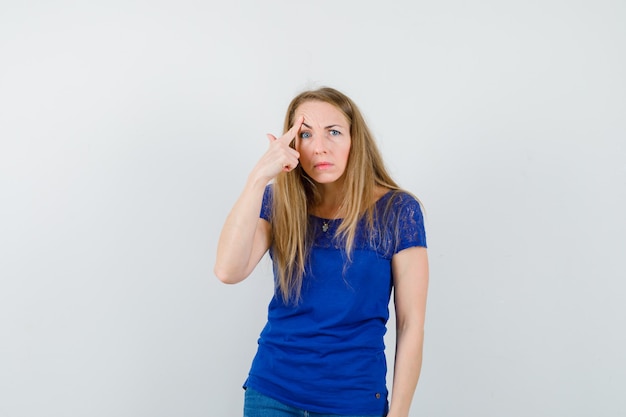 Expressive young woman posing in the studio