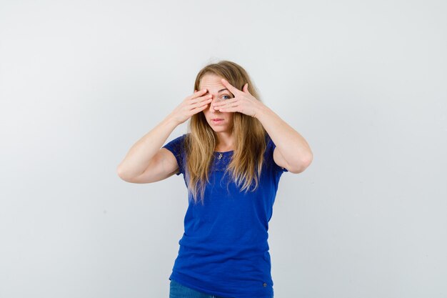 Expressive young woman posing in the studio