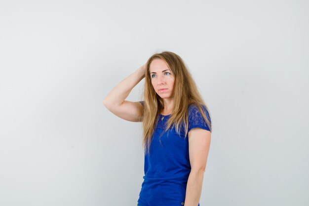 Expressive young woman posing in the studio