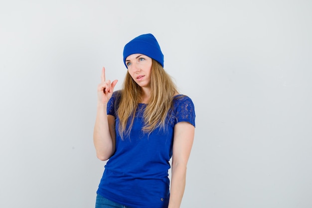 Expressive young woman posing in the studio