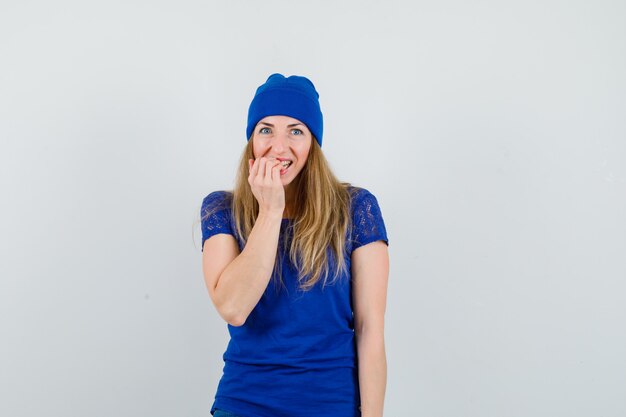 Expressive young woman posing in the studio