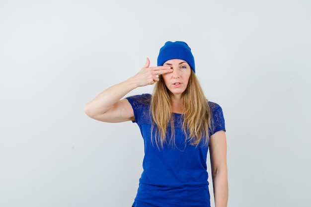 Expressive young woman posing in the studio