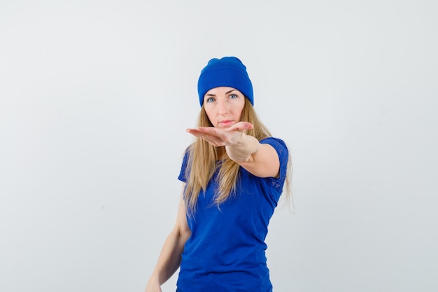 Expressive young woman posing in the studio