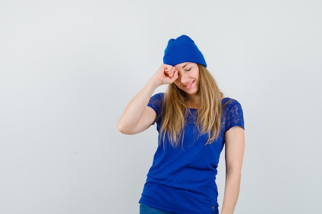 Expressive young woman posing in the studio