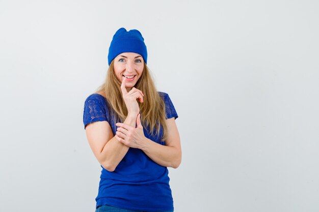 Expressive young woman posing in the studio