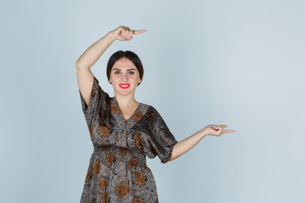 Expressive young woman posing in the studio