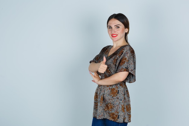 Expressive young woman posing in the studio