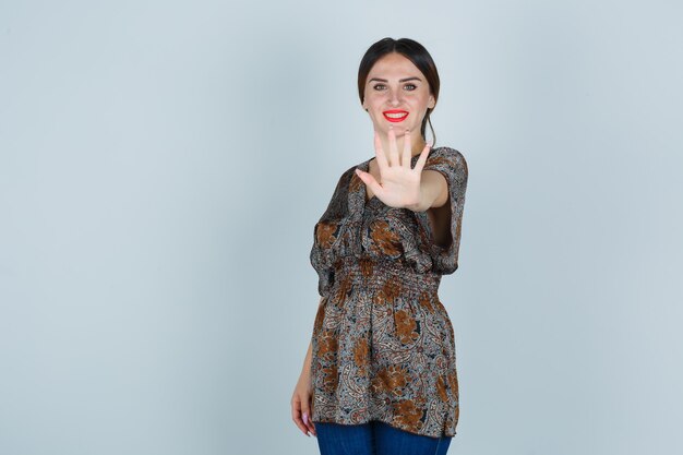 Expressive young woman posing in the studio