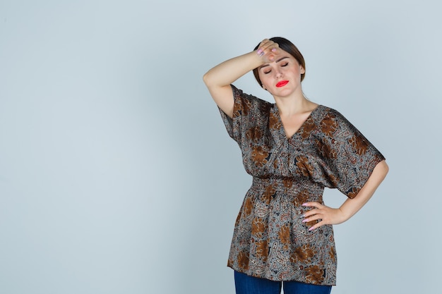 Expressive young woman posing in the studio