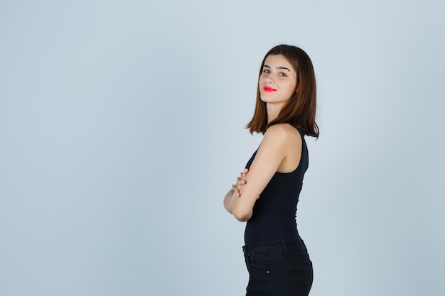 Expressive young woman posing in the studio