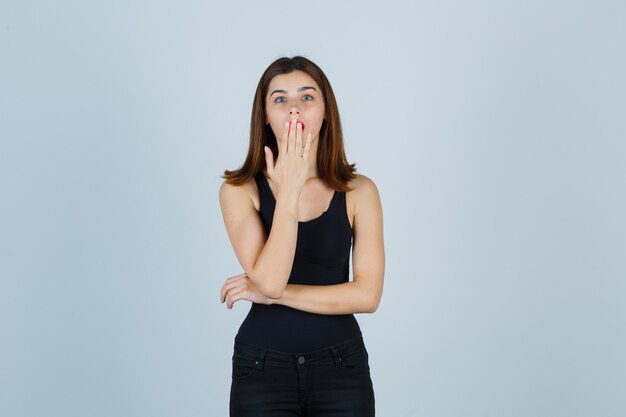 Expressive young woman posing in the studio