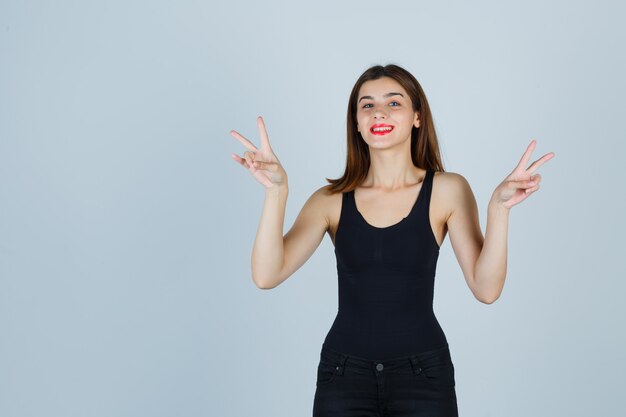 Expressive young woman posing in the studio