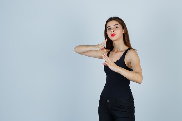 Expressive young woman posing in the studio