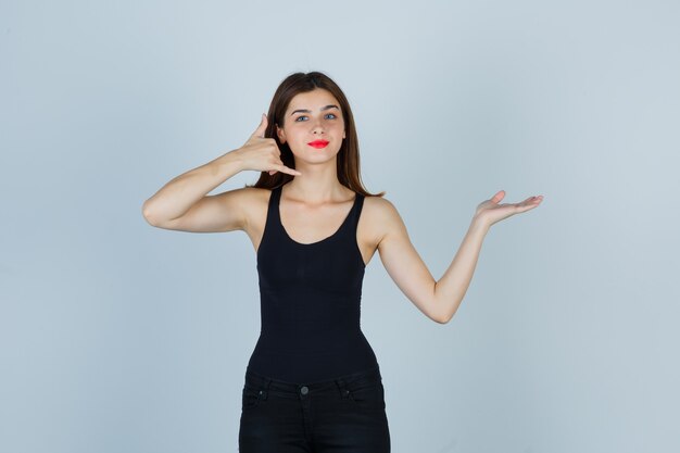 Expressive young woman posing in the studio