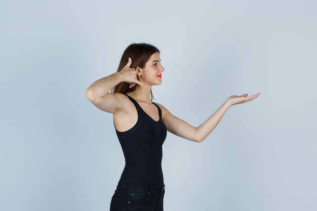 Expressive young woman posing in the studio