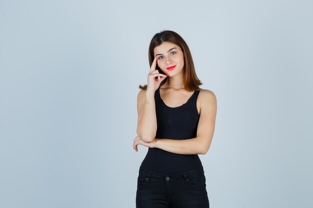 Expressive young woman posing in the studio